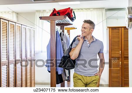 Man in locker room View Large Photo Image Stock Photography - Man in locker room. Fotosearch