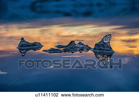 Stock Image - Melting ice floating, Jokulsarlon Lagoon, Iceland. Fotosearch