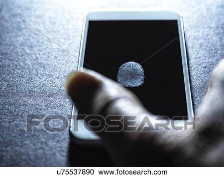 Mobile phone being accessed using finger print identity View Large Photo Image Stock Image - Mobile phone being accessed using finger print identity. Fotosearch