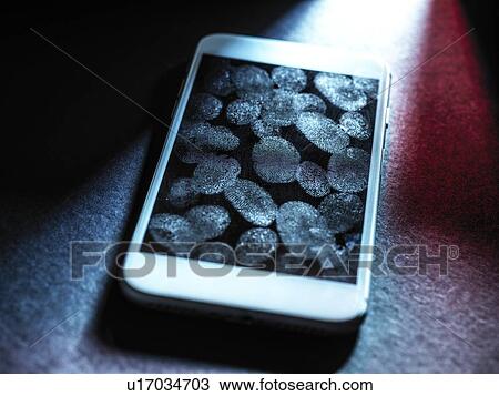Stock Image - Mobile phone security, conceptual image. Fotosearch