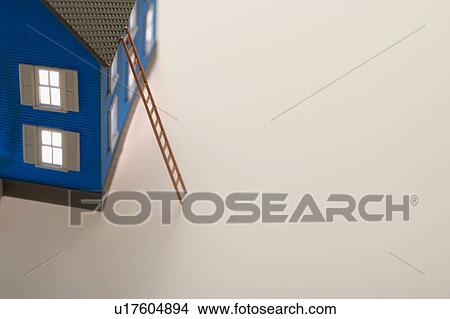 Model of house with ladder View Large Photo Image Picture - Model of house with ladder. Fotosearch