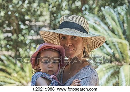Mother with baby girl in forest View Large Photo Image Stock Photo - Mother with baby girl in forest. Fotosearch