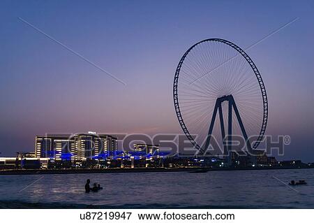 Stock Photo - Night scene, the Eye of Dubai, Dubai, UAE. Fotosearch
