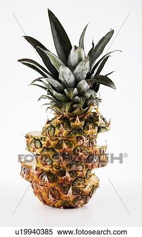 Odd shaped sliced pineapple View Large Photo Image Stock Photography - Odd shaped sliced pineapple. Fotosearch