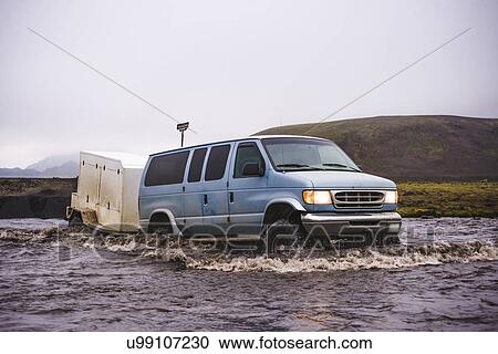 Off road vehicle driving through water, Landmannalaugar, Iceland View Large Photo Image Stock Image - Off road vehicle driving through water, Landmannalaugar, Iceland. Fotosearch