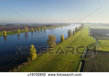 Overdiepse polder, protecting city and surrounding areas from high water, Sprang-Capelle, Noord-Brabant, Netherlands View Large Photo Image Stock Image - Overdiepse polder, protecting city and surrounding areas from high water, Sprang-Capelle, Noord-Brabant, Netherlands. Fotosearch