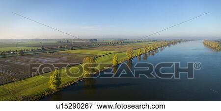 Overdiepse polder, protecting city and surrounding areas from high water, Sprang-Capelle, Noord-Brabant, Netherlands View Large Photo Image Stock Photo - Overdiepse polder, protecting city and surrounding areas from high water, Sprang-Capelle, Noord-Brabant, Netherlands. Fotosearch