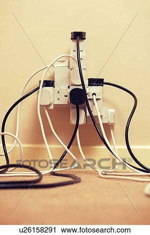 Overloaded multi extension plug View Large Photo Image Stock Image - Overloaded multi extension plug. Fotosearch