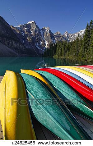 Overturned canoes, Moraine Lake, Valley of the Ten Peaks, Banff National Park, Rocky Mountains, Alberta, Canada View Large Photo Image Stock Photograph - Overturned canoes, Moraine Lake, Valley of the Ten Peaks, Banff National Park, Rocky Mountains, Alberta, Canada. Fotosearch