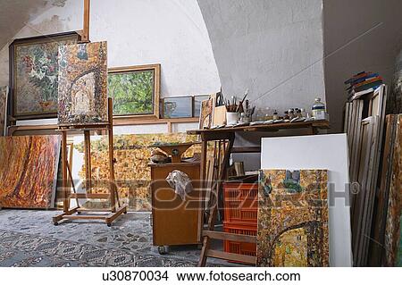 Paints and Canvases in Artist's Studio View Large Photo Image Picture - Paints and Canvases in Artist's Studio. Fotosearch