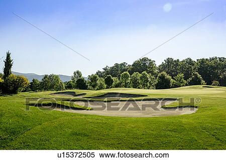 Stock Photography - Peaceful scenic view of golf course. Fotosearch