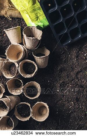 Picture - Peat pots and soil. Fotosearch
