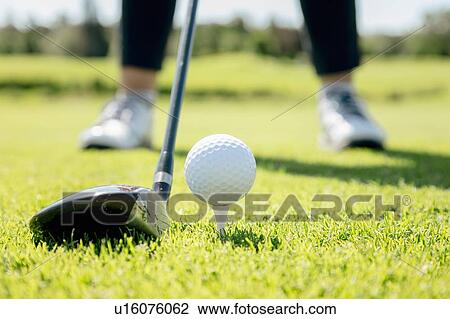 Person playing golf on golf course View Large Photo Image Stock Image - Person playing golf on golf course. Fotosearch