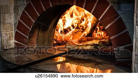 Pizza being removed from stone oven View Large Photo Image Stock Image - Pizza being removed from stone oven. Fotosearch