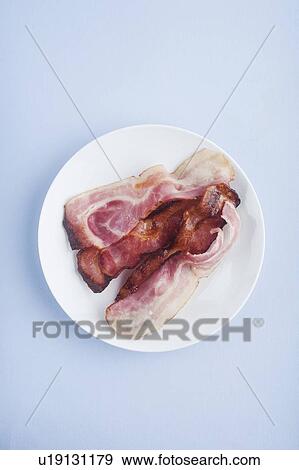 Plate of cooked bacon View Large Photo Image Stock Photo - Plate of cooked bacon. Fotosearch
