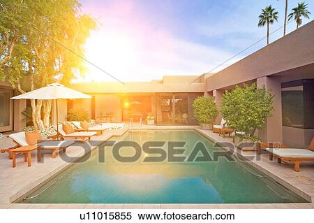Stock Photography - Pool area in luxurious house. Fotosearch