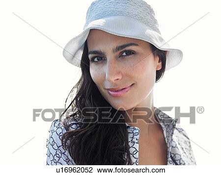 Portrait of beautiful young brunette woman wearing cap View Large Photo Image Stock Image - Portrait of beautiful young brunette woman wearing cap. Fotosearch