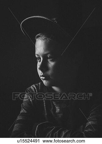 Portrait of young boy in cap View Large Photo Image Stock Image - Portrait of young boy in cap. Fotosearch