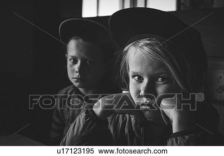 Portrait of young boys in cap View Large Photo Image Stock Photography - Portrait of young boys in cap. Fotosearch