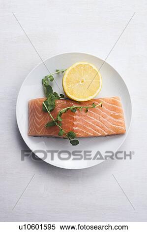 Raw salmon and lemon View Large Photo Image Stock Photography - Raw salmon and lemon. Fotosearch