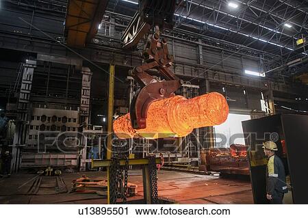 Red hot steel ingot being craned to forge in steelworks View Large Photo Image Stock Image - Red hot steel ingot being craned to forge in steelworks. Fotosearch