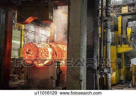 Red hot steel ingot in steel press in steelworks View Large Photo Image Stock Photo - Red hot steel ingot in steel press in steelworks. Fotosearch