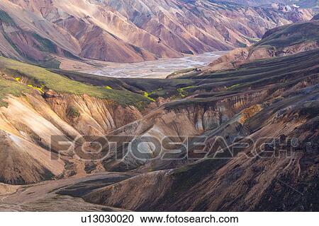 River in valley between hillsides, Landmannalaugar, Iceland View Large Photo Image Stock Image - River in valley between hillsides, Landmannalaugar, Iceland. Fotosearch