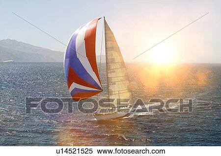 Sailboat in Sail with strong lens flare View Large Photo Image Stock Photography - Sailboat in Sail with strong lens flare. Fotosearch