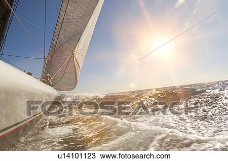 Stock Image - Sailboat on ocean. Fotosearch