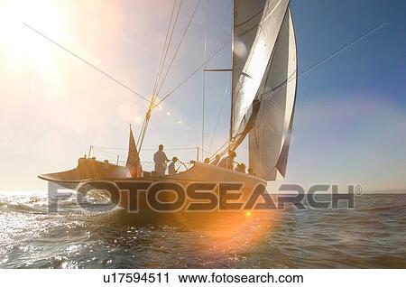 Stock Image - Sailboat on ocean. Fotosearch