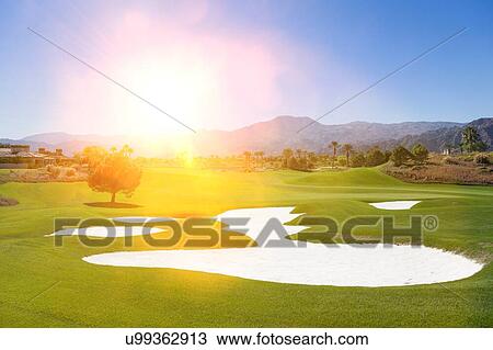 Sand bunker on sunny golf course View Large Photo Image Stock Image - Sand bunker on sunny golf course. Fotosearch