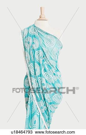 Sari draped on tailor's dummy against gray background View Large Photo Image Stock Image - Sari draped on tailor's dummy against gray background. Fotosearch