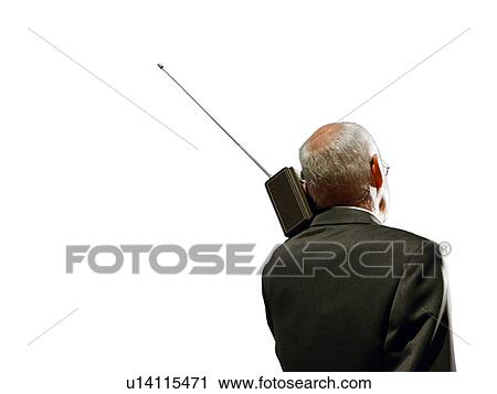 Senior business man using vintage radio View Large Photo Image Stock Image - Senior business man using vintage radio. Fotosearch