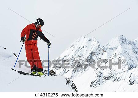 Skier resting on snow, Khtai, Tyrol, Austria View Large Photo Image Stock Photography - Skier resting on snow, Khtai, Tyrol, Austria. Fotosearch