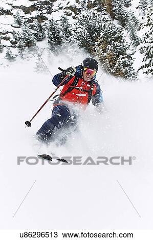 Skier skiing and splashing snow, Khtai, Austria View Large Photo Image Stock Image - Skier skiing and splashing snow, Khtai, Austria. Fotosearch