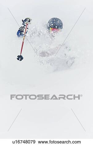 Skier skiing and splashing snow View Large Photo Image Stock Photo - Skier skiing and splashing snow. Fotosearch