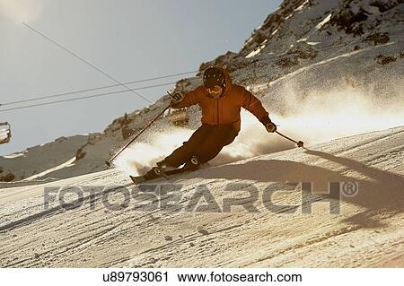 Stock Image - Skier skiing, Khtai, Austria. Fotosearch
