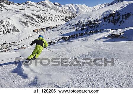 Stock Photograph - Skier skiing, Khtai, Austria. Fotosearch