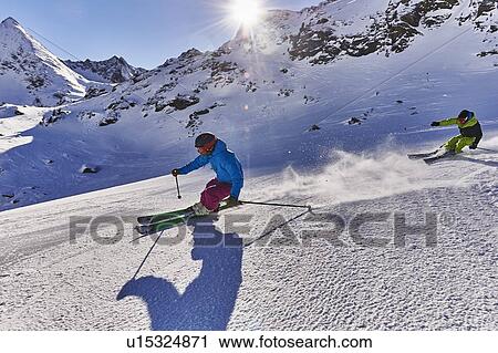 Skiers skiing, Khtai, Austria View Large Photo Image Stock Image - Skiers skiing, Khtai, Austria. Fotosearch