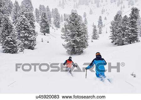 Stock Image - Skiers skiing, Khtai, Austria. Fotosearch