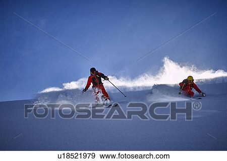 Skiers skiing View Large Photo Image Stock Photo - Skiers skiing. Fotosearch