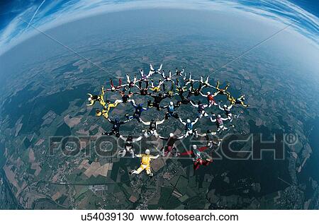 Stock Image - Skydivers in Formation. Fotosearch