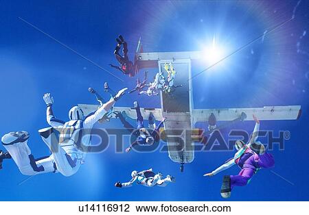Stock Image - Skydivers Jumping From Airplane. Fotosearch