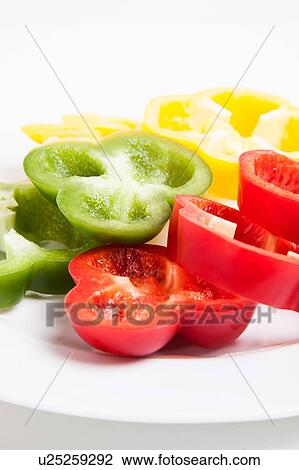 Sliced Green Red and Yelloe Peppers View Large Photo Image Stock Image - Sliced Green Red and Yelloe Peppers. Fotosearch