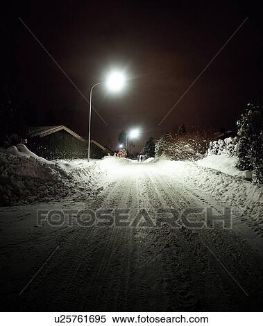 Snow-covered Street at Night View Large Photo Image Stock Photography - Snow-covered Street at Night. Fotosearch