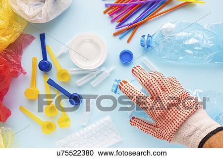Stock Image - Sorting plastic waste. Fotosearch