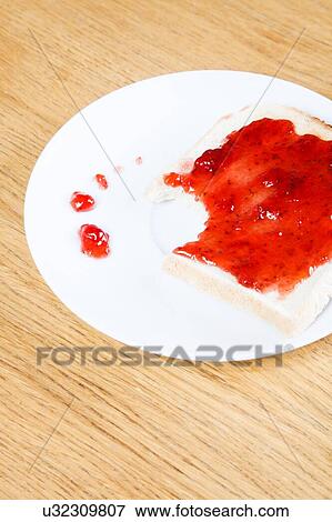 Strawberry Jam on toast View Large Photo Image Stock Photo - Strawberry Jam on toast. Fotosearch