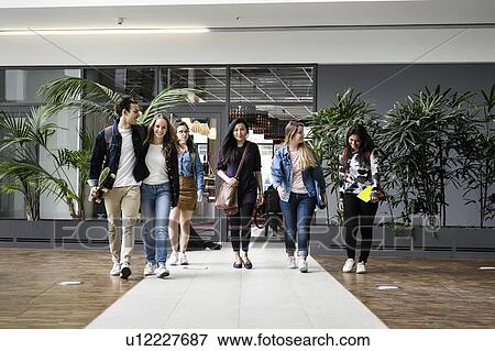 Students talking and walking in college premise View Large Photo Image Stock Photo - Students talking and walking in college premise. Fotosearch