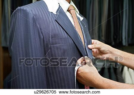 Tailor Fitting Man in Suit View Large Photo Image Stock Photography - Tailor Fitting Man in Suit. Fotosearch