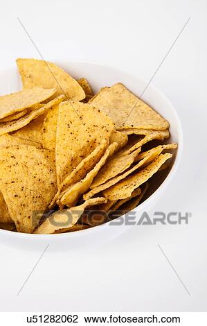 Stock Image - Tortilla nacho chips in bowl. Fotosearch